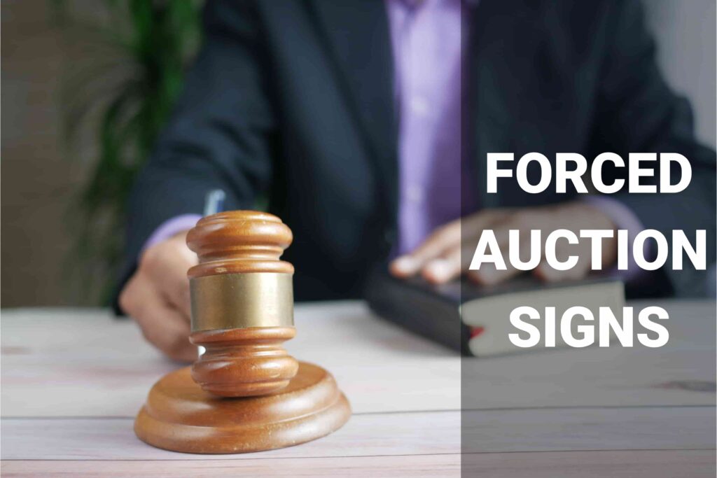 forced auction signs